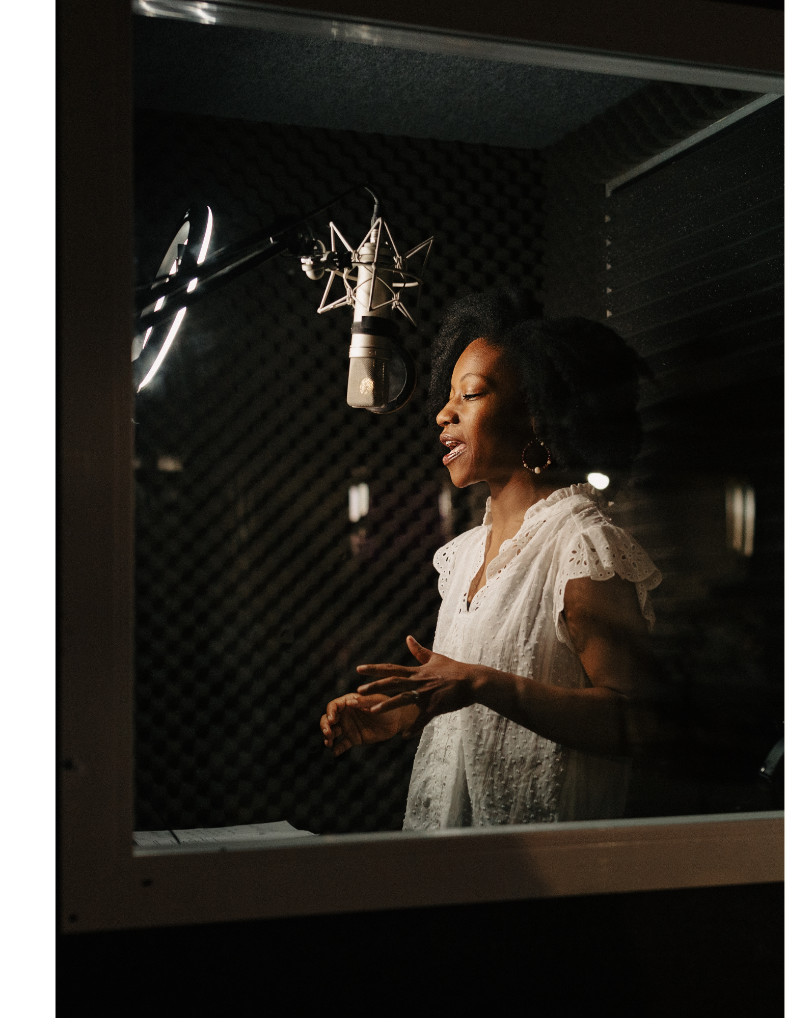 Carrie Olsen recording in the voiceover booth